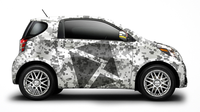 Small car wrapped with a graphic